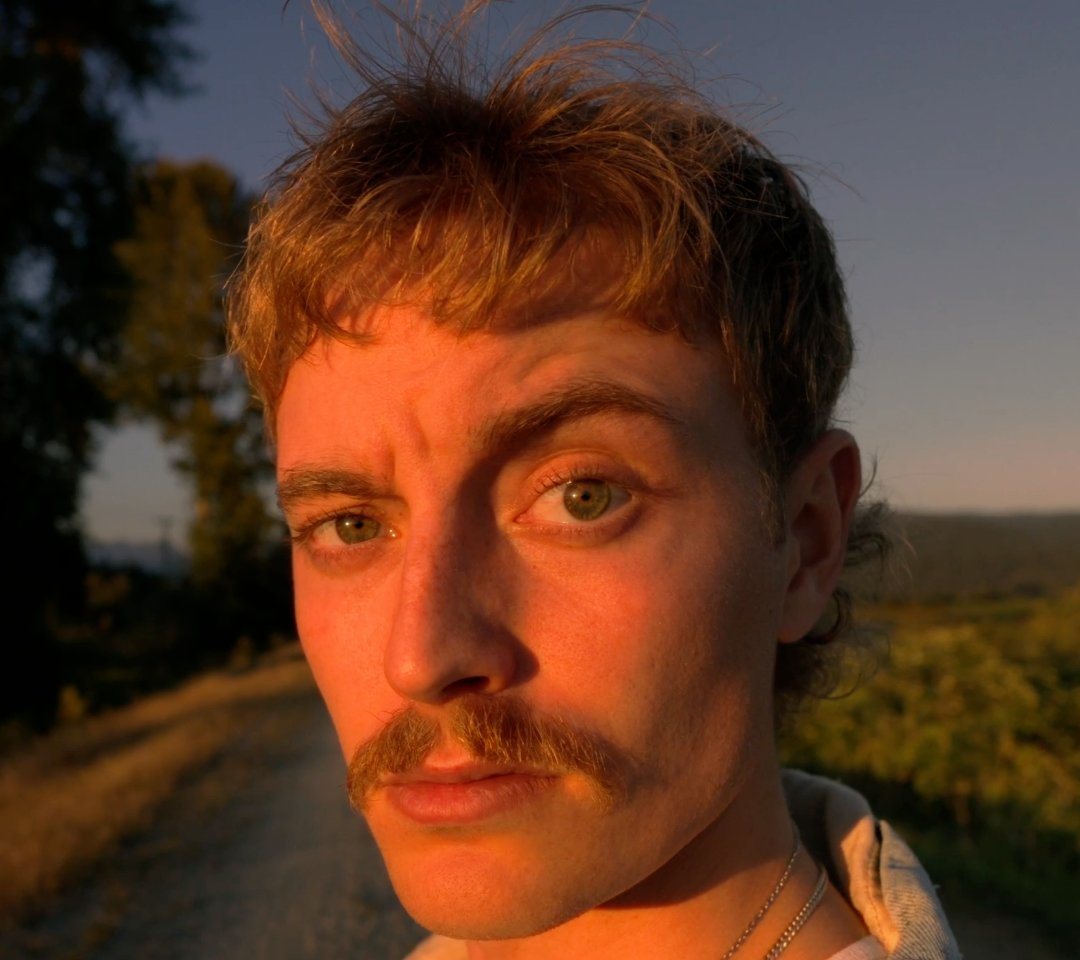 Chace Cade at golden hour on a country road